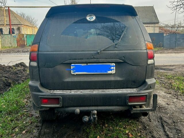 Черный Мицубиси Паджеро Спорт, объемом двигателя 3 л и пробегом 300 тыс. км за 5500 $, фото 1 на Automoto.ua