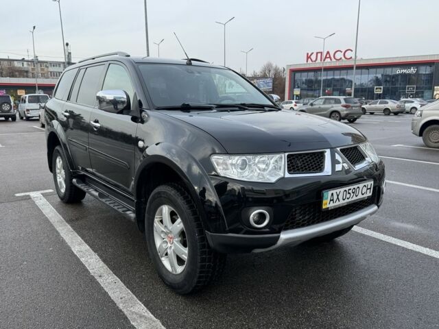 Черный Мицубиси Паджеро Спорт, объемом двигателя 2.5 л и пробегом 219 тыс. км за 12000 $, фото 1 на Automoto.ua