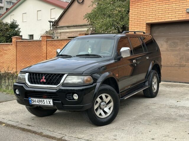 Чорний Міцубісі Паджеро Спорт, об'ємом двигуна 3 л та пробігом 200 тис. км за 5999 $, фото 1 на Automoto.ua