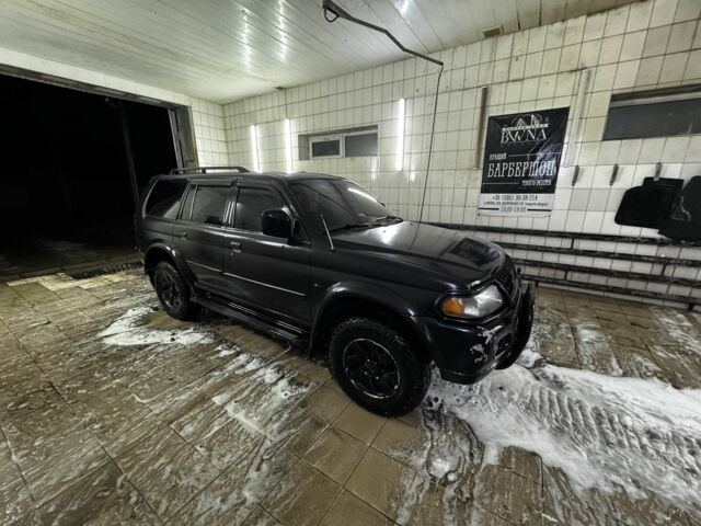 Черный Мицубиси Паджеро Спорт, объемом двигателя 3 л и пробегом 420 тыс. км за 4500 $, фото 1 на Automoto.ua