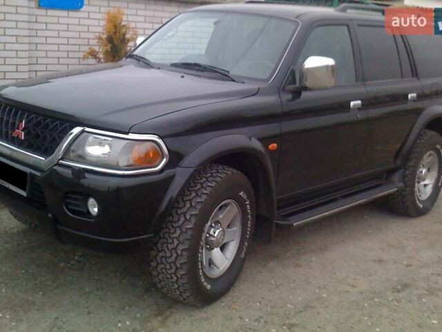 Черный Мицубиси Паджеро Спорт, объемом двигателя 3 л и пробегом 290 тыс. км за 6500 $, фото 1 на Automoto.ua