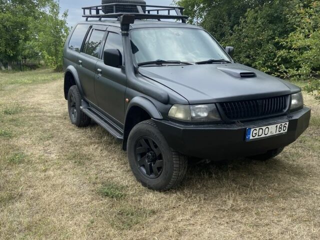 Мицубиси Паджеро Спорт 2002 в Тальном на Automoto.ua Черный Мицубиси Паджеро Спорт, объемом двигателя 2.5 л и пробегом 200 тыс. км за 3600 $, фото 1 на Automoto.ua