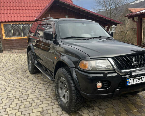 Черный Мицубиси Паджеро Спорт, объемом двигателя 3 л и пробегом 305 тыс. км за 7200 $, фото 1 на Automoto.ua