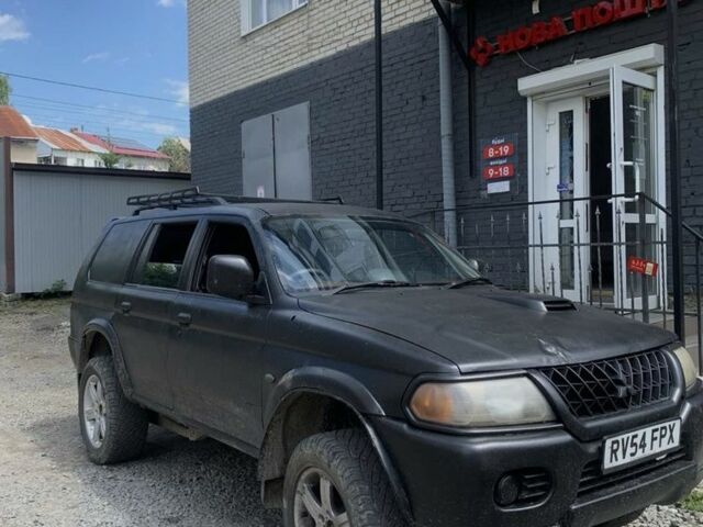 Черный Мицубиси Паджеро Спорт, объемом двигателя 2.5 л и пробегом 129 тыс. км за 3700 $, фото 1 на Automoto.ua