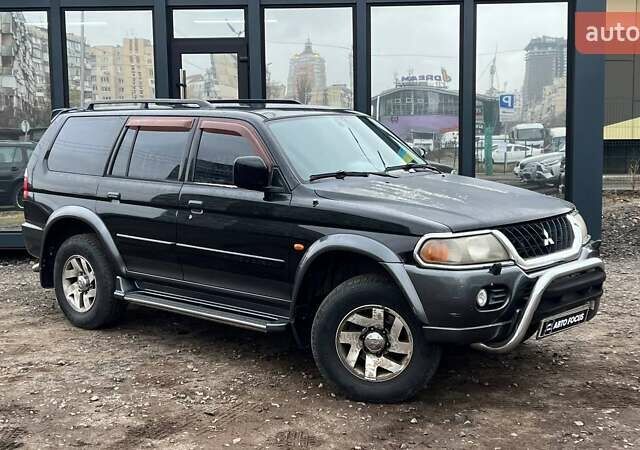 Черный Мицубиси Паджеро Спорт, объемом двигателя 3 л и пробегом 239 тыс. км за 7790 $, фото 1 на Automoto.ua