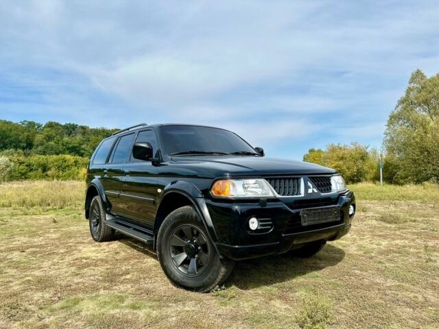 Черный Мицубиси Паджеро Спорт, объемом двигателя 3 л и пробегом 250 тыс. км за 8300 $, фото 1 на Automoto.ua