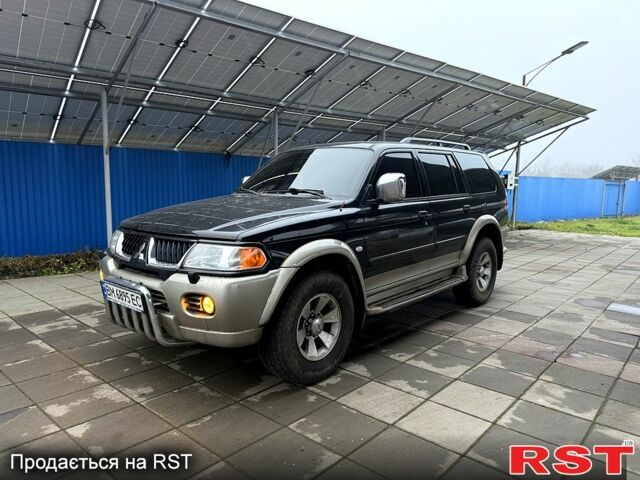 Черный Мицубиси Паджеро Спорт, объемом двигателя 3 л и пробегом 164 тыс. км за 8600 $, фото 1 на Automoto.ua