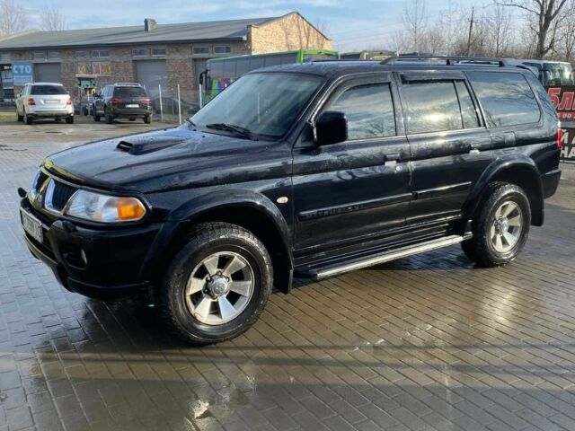 Чорний Міцубісі Паджеро Спорт, об'ємом двигуна 2.5 л та пробігом 209 тис. км за 8300 $, фото 1 на Automoto.ua