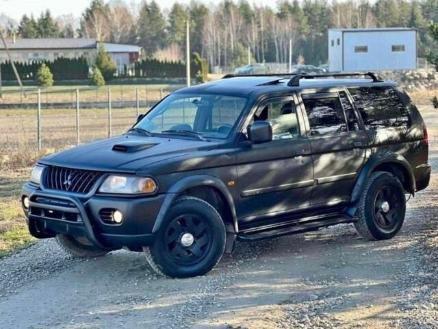 Черный Мицубиси Паджеро Спорт, объемом двигателя 2.5 л и пробегом 239 тыс. км за 2950 $, фото 1 на Automoto.ua