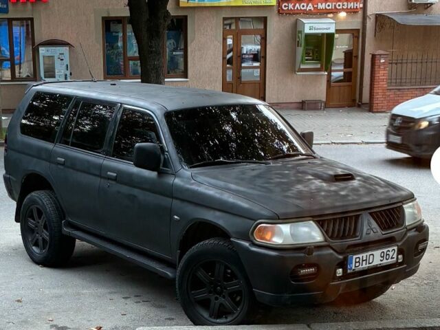 Черный Мицубиси Паджеро Спорт, объемом двигателя 2.5 л и пробегом 400 тыс. км за 4276 $, фото 1 на Automoto.ua