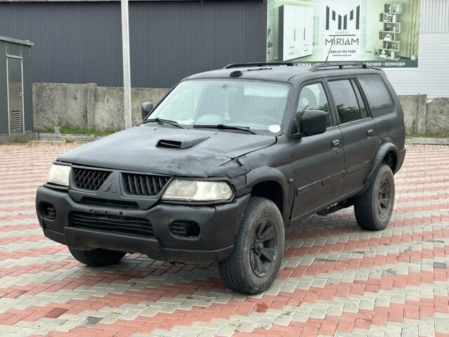 Чорний Міцубісі Паджеро Спорт, об'ємом двигуна 2.5 л та пробігом 220 тис. км за 2750 $, фото 1 на Automoto.ua