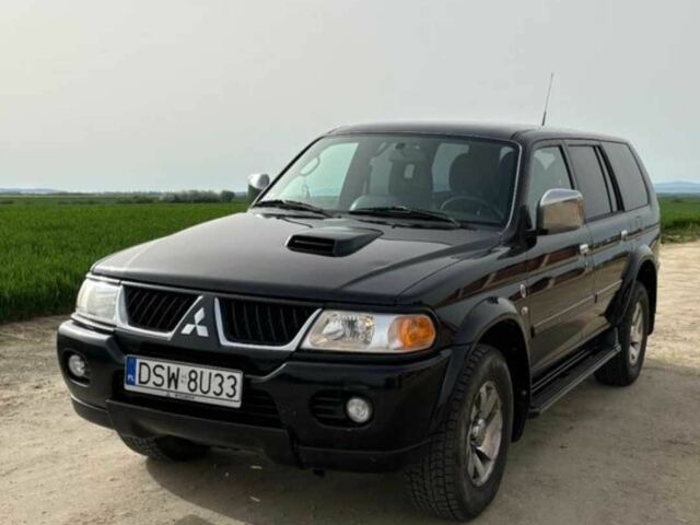 Чорний Міцубісі Паджеро Спорт, об'ємом двигуна 2.5 л та пробігом 308 тис. км за 4800 $, фото 1 на Automoto.ua