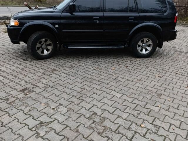 Чорний Міцубісі Паджеро Спорт, об'ємом двигуна 3 л та пробігом 238 тис. км за 8500 $, фото 1 на Automoto.ua