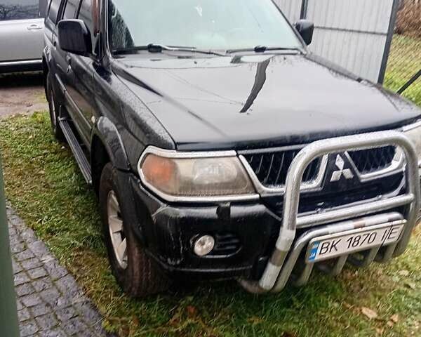 Чорний Міцубісі Паджеро Спорт, об'ємом двигуна 2.97 л та пробігом 230 тис. км за 9500 $, фото 1 на Automoto.ua