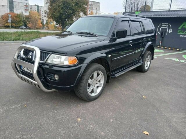 Чорний Міцубісі Паджеро Спорт, об'ємом двигуна 3 л та пробігом 200 тис. км за 8300 $, фото 1 на Automoto.ua