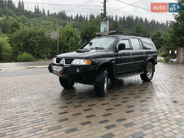 Черный Мицубиси Паджеро Спорт, объемом двигателя 2.48 л и пробегом 227 тыс. км за 9999 $, фото 1 на Automoto.ua