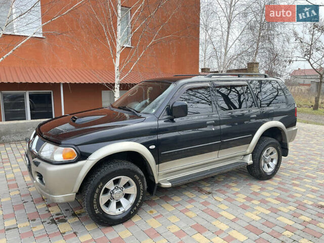 Чорний Міцубісі Паджеро Спорт, об'ємом двигуна 0 л та пробігом 273 тис. км за 10300 $, фото 1 на Automoto.ua
