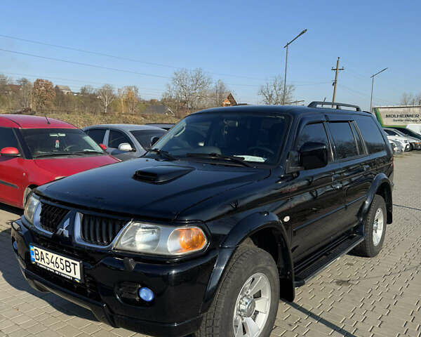 Черный Мицубиси Паджеро Спорт, объемом двигателя 2.48 л и пробегом 163 тыс. км за 10500 $, фото 1 на Automoto.ua