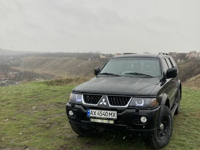 Чорний Міцубісі Паджеро Спорт, об'ємом двигуна 3 л та пробігом 220 тис. км за 8200 $, фото 1 на Automoto.ua