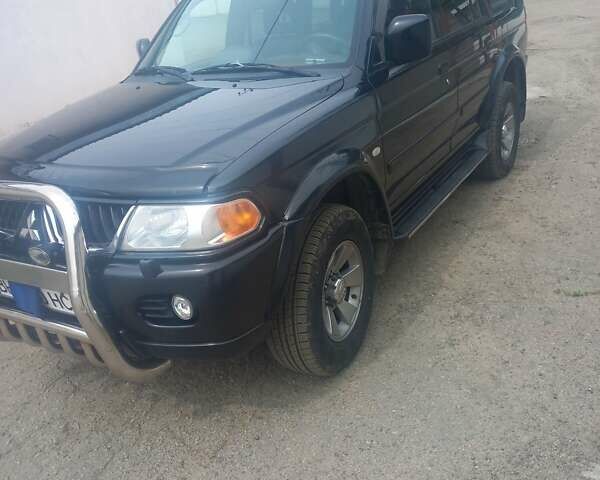 Черный Мицубиси Паджеро Спорт, объемом двигателя 3 л и пробегом 213 тыс. км за 8500 $, фото 1 на Automoto.ua