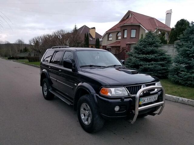 Черный Мицубиси Паджеро Спорт, объемом двигателя 2.5 л и пробегом 264 тыс. км за 11200 $, фото 1 на Automoto.ua