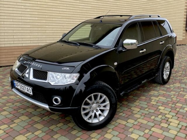 Черный Мицубиси Паджеро Спорт, объемом двигателя 2.5 л и пробегом 154 тыс. км за 13850 $, фото 1 на Automoto.ua