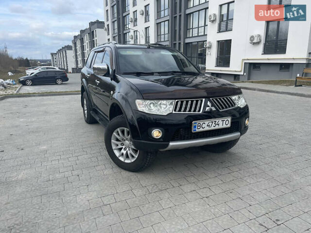 Черный Мицубиси Паджеро Спорт, объемом двигателя 2.48 л и пробегом 221 тыс. км за 15000 $, фото 1 на Automoto.ua