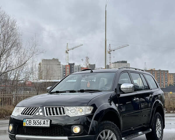 Черный Мицубиси Паджеро Спорт, объемом двигателя 2.5 л и пробегом 219 тыс. км за 12200 $, фото 1 на Automoto.ua