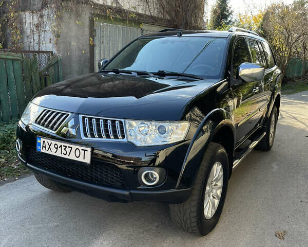 Черный Мицубиси Паджеро Спорт, объемом двигателя 2.5 л и пробегом 169 тыс. км за 15200 $, фото 1 на Automoto.ua