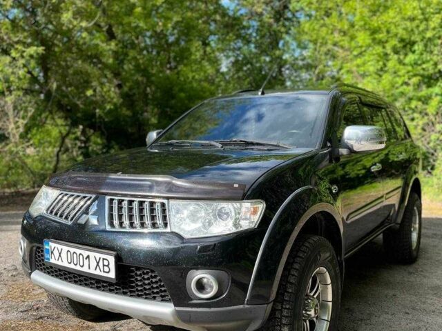 Чорний Міцубісі Паджеро Спорт, об'ємом двигуна 2.5 л та пробігом 150 тис. км за 16700 $, фото 1 на Automoto.ua