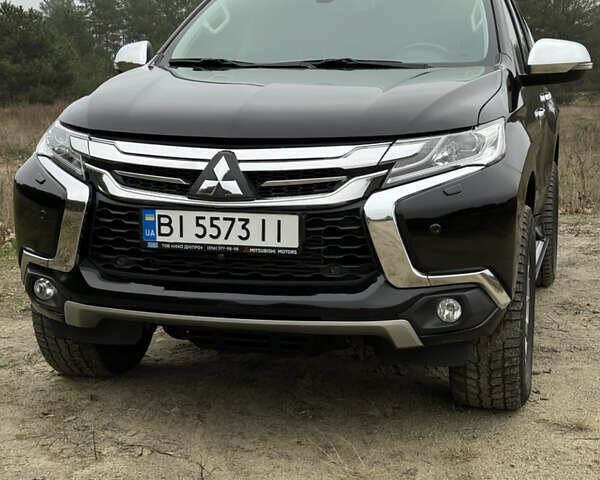 Чорний Міцубісі Паджеро Спорт, об'ємом двигуна 2.44 л та пробігом 96 тис. км за 28799 $, фото 1 на Automoto.ua
