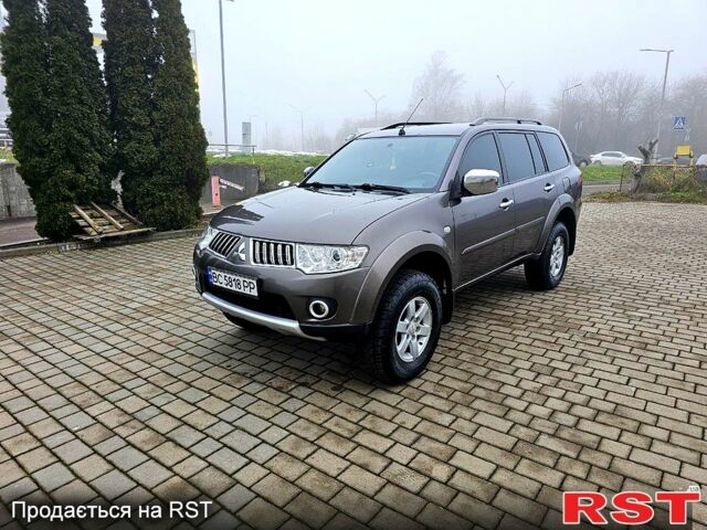 Коричневий Міцубісі Паджеро Спорт, об'ємом двигуна 2.5 л та пробігом 395 тис. км за 14000 $, фото 1 на Automoto.ua