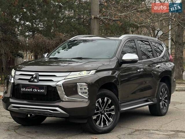 Коричневий Міцубісі Паджеро Спорт, об'ємом двигуна 2.44 л та пробігом 131 тис. км за 34499 $, фото 1 на Automoto.ua