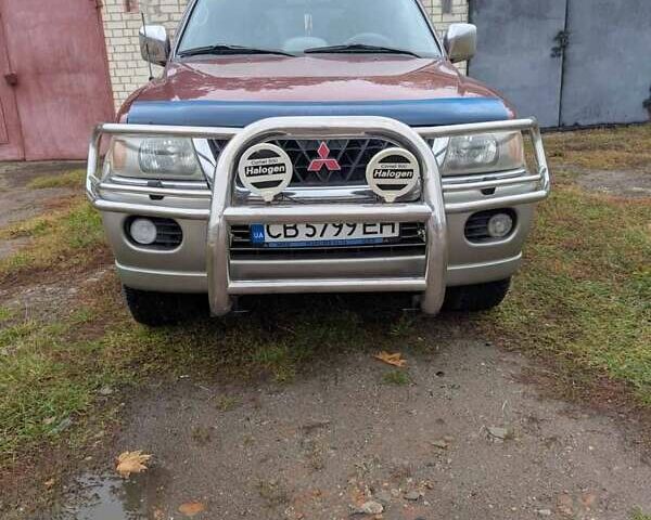 Мицубиси Паджеро Спорт 2000 в Чернигове на Automoto.ua Красный Мицубиси Паджеро Спорт, объемом двигателя 2.97 л и пробегом 311 тыс. км за 5700 $, фото 1 на Automoto.ua