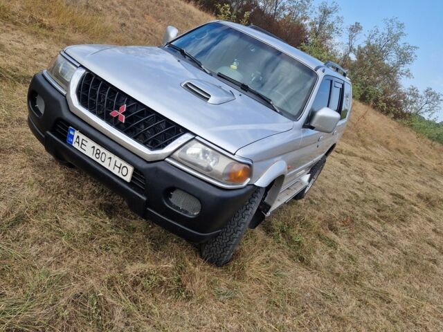 Серый Мицубиси Паджеро Спорт, объемом двигателя 2.5 л и пробегом 230 тыс. км за 5700 $, фото 1 на Automoto.ua