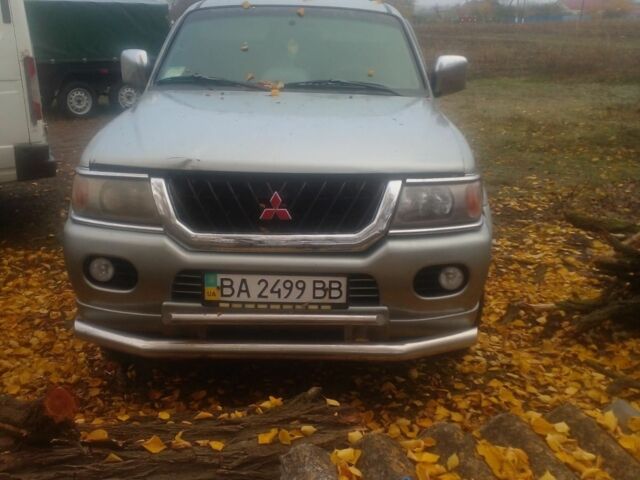 Серый Мицубиси Паджеро Спорт, объемом двигателя 3 л и пробегом 280 тыс. км за 3788 $, фото 1 на Automoto.ua