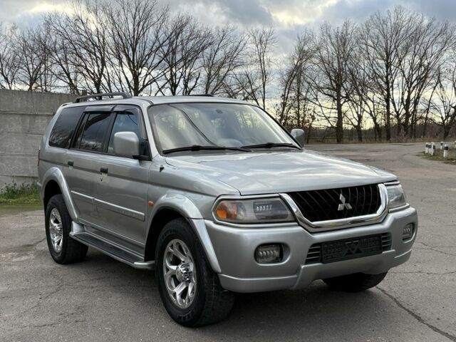 Серый Мицубиси Паджеро Спорт, объемом двигателя 3 л и пробегом 240 тыс. км за 6499 $, фото 1 на Automoto.ua
