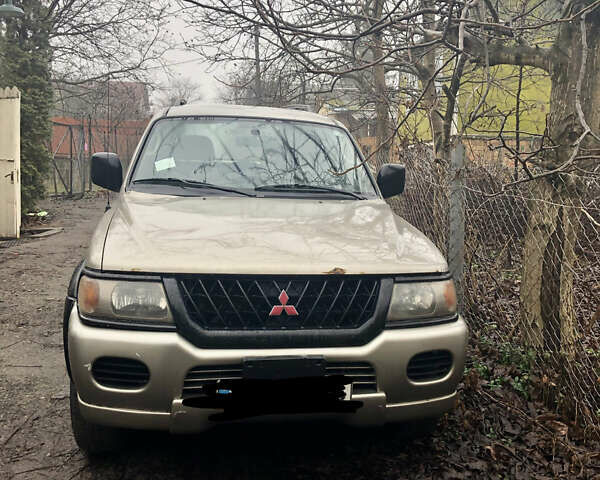 Сірий Міцубісі Паджеро Спорт, об'ємом двигуна 3 л та пробігом 300 тис. км за 6500 $, фото 1 на Automoto.ua