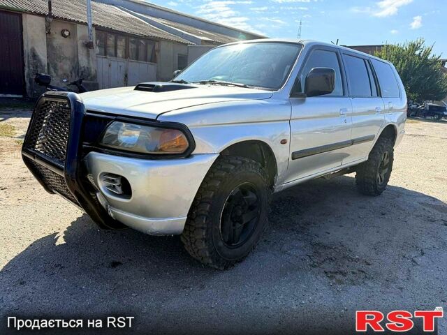 Сірий Міцубісі Паджеро Спорт, об'ємом двигуна 2.5 л та пробігом 267 тис. км за 3500 $, фото 1 на Automoto.ua