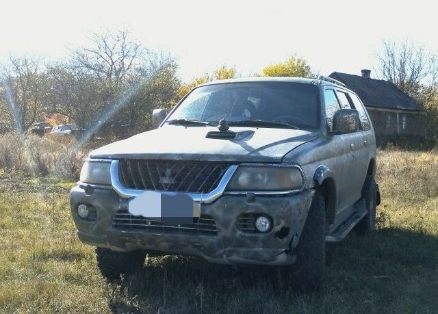 Сірий Міцубісі Паджеро Спорт, об'ємом двигуна 2.5 л та пробігом 396 тис. км за 4900 $, фото 1 на Automoto.ua