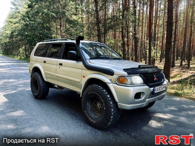 Серый Мицубиси Паджеро Спорт, объемом двигателя 3 л и пробегом 242 тыс. км за 6999 $, фото 1 на Automoto.ua