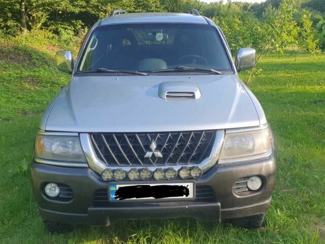 Серый Мицубиси Паджеро Спорт, объемом двигателя 2.5 л и пробегом 235 тыс. км за 8800 $, фото 1 на Automoto.ua