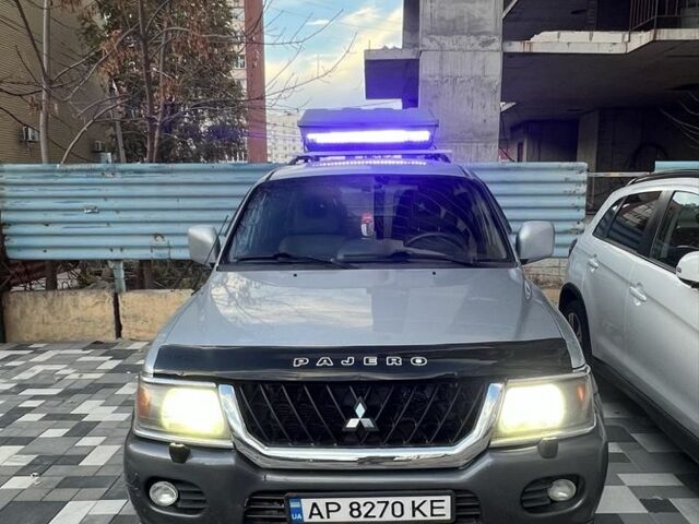 Серый Мицубиси Паджеро Спорт, объемом двигателя 3 л и пробегом 283 тыс. км за 6700 $, фото 1 на Automoto.ua