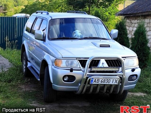 Серый Мицубиси Паджеро Спорт, объемом двигателя 2.5 л и пробегом 280 тыс. км за 10000 $, фото 1 на Automoto.ua