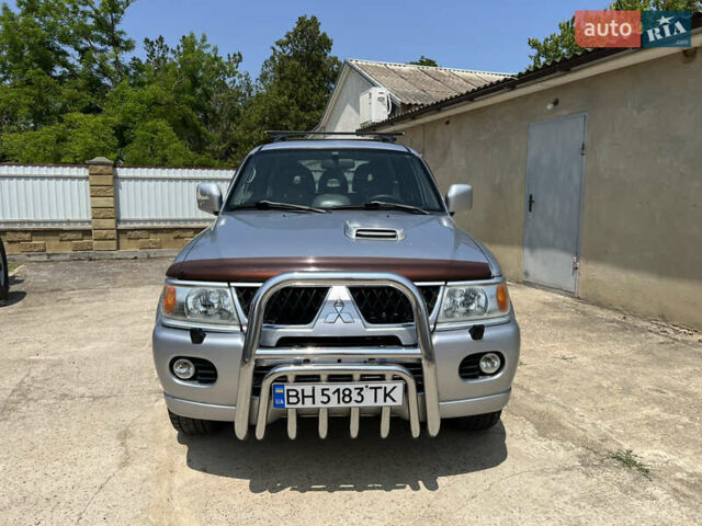 Серый Мицубиси Паджеро Спорт, объемом двигателя 2.48 л и пробегом 395 тыс. км за 9500 $, фото 1 на Automoto.ua