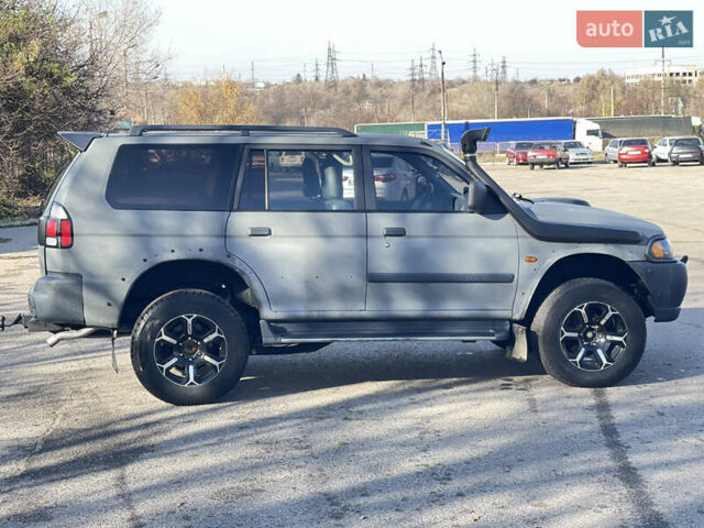 Сірий Міцубісі Паджеро Спорт, об'ємом двигуна 2.48 л та пробігом 225 тис. км за 8800 $, фото 1 на Automoto.ua