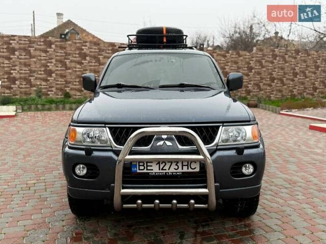 Серый Мицубиси Паджеро Спорт, объемом двигателя 2.97 л и пробегом 322 тыс. км за 7700 $, фото 1 на Automoto.ua