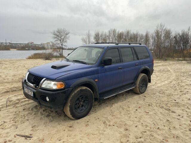 Синий Мицубиси Паджеро Спорт, объемом двигателя 2.5 л и пробегом 320 тыс. км за 4400 $, фото 1 на Automoto.ua