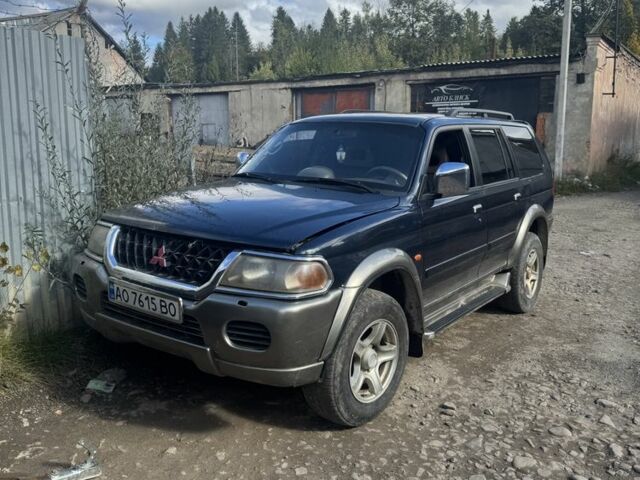 Синій Міцубісі Паджеро Спорт, об'ємом двигуна 3 л та пробігом 255 тис. км за 4800 $, фото 1 на Automoto.ua