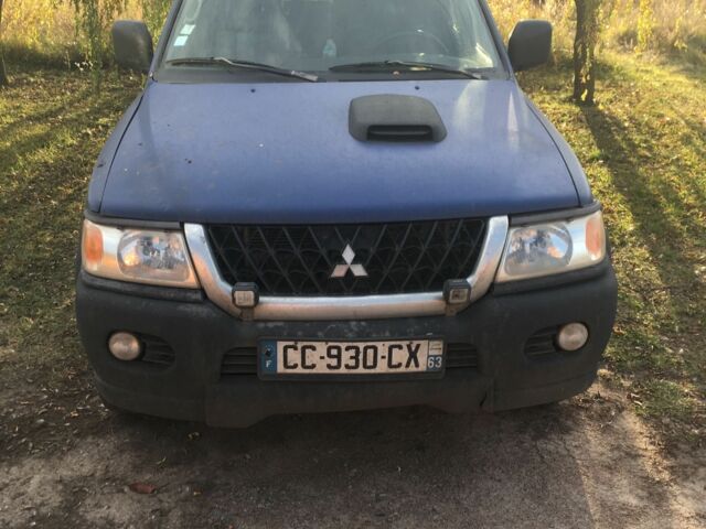 Синій Міцубісі Паджеро Спорт, об'ємом двигуна 2.5 л та пробігом 300 тис. км за 3500 $, фото 1 на Automoto.ua